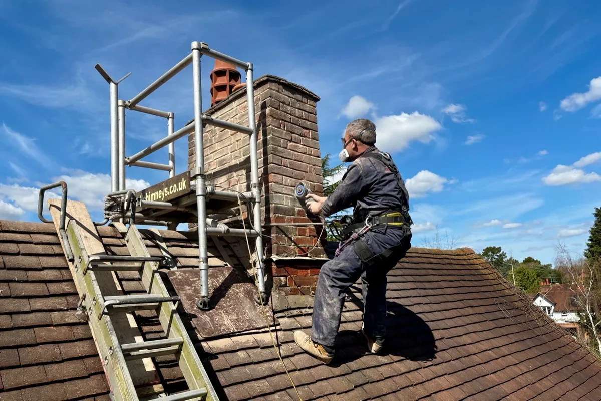 Chimney repair and pointing carried out using safe rope access and a chimney platform in Herne Bay